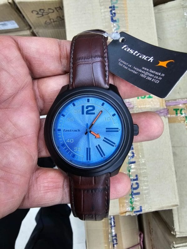 Fastrack NP3198AL02 Road Trip Quartz Analog Blue Dial Leather Strap Watch